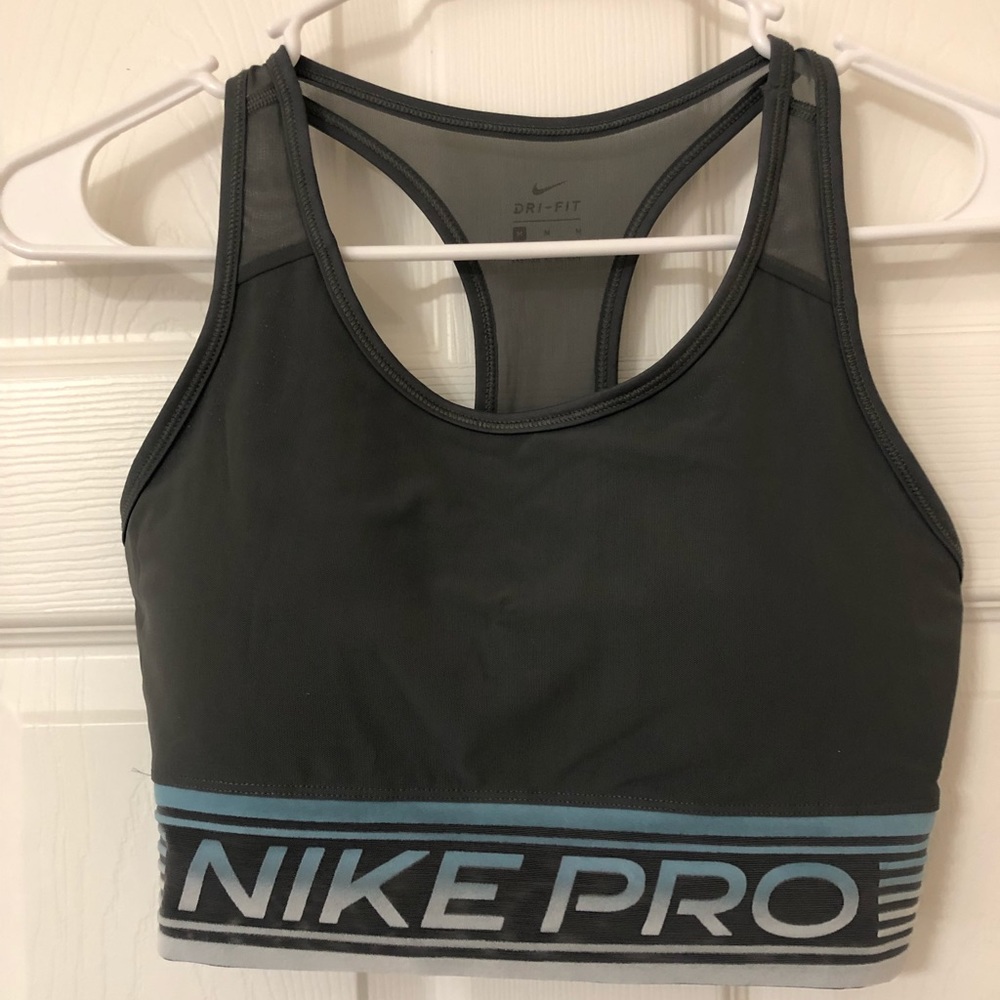 Charcoal Nike pro bra with see thru back detail. Only worn a few times.